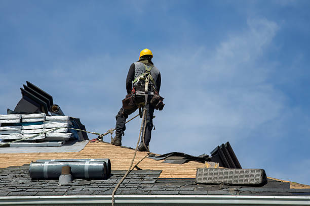 Professional Roofing technician working in West Newton, MA